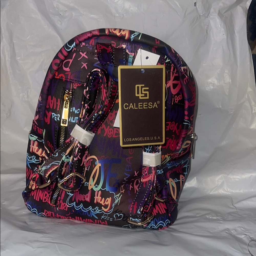 Purple and Red Urban Backpack with Graffiti Design - Picture 2 of 3